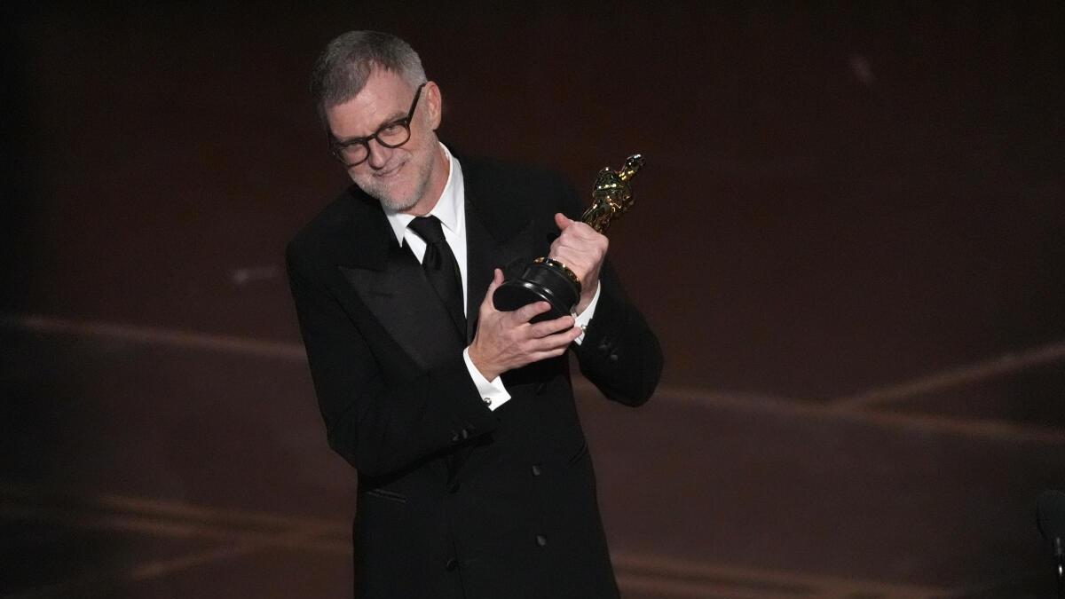 Paul Thomas Anderson accepts the award for directing for ‘One Battle After Another’ during the Oscars on Monday, March 16, 2026, at the Dolby Theatre in Los Angeles.